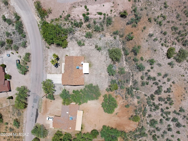 drone / aerial view with view of desert