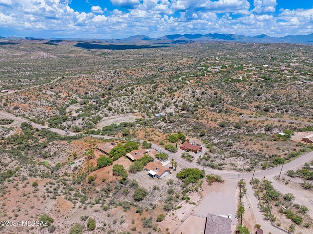 aerial view with a mountain view and a desert view