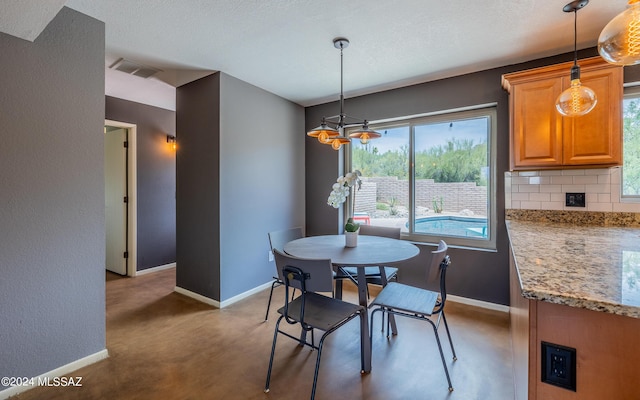 dining space with a wealth of natural light