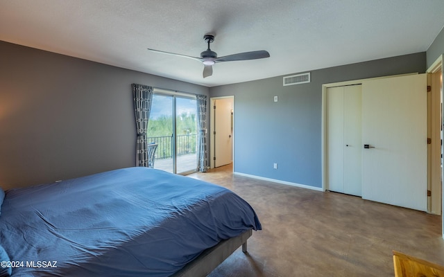 bedroom with access to outside, ceiling fan, a closet, and a textured ceiling