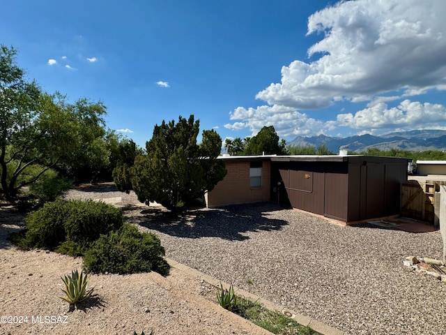 exterior space featuring a mountain view