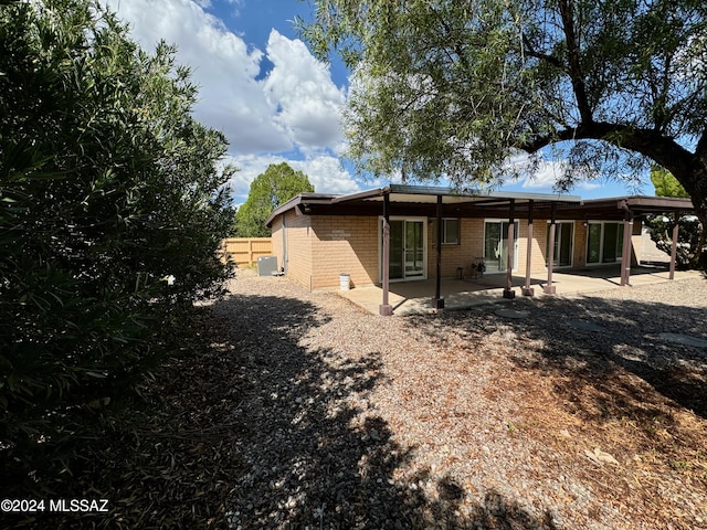 rear view of house featuring a patio area