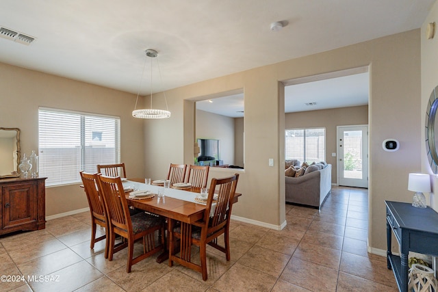 view of tiled dining space