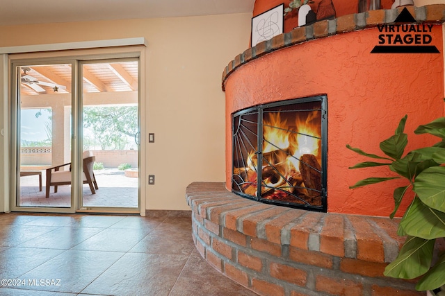 room details featuring a brick fireplace