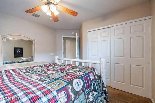 bedroom featuring carpet, a closet, and ceiling fan