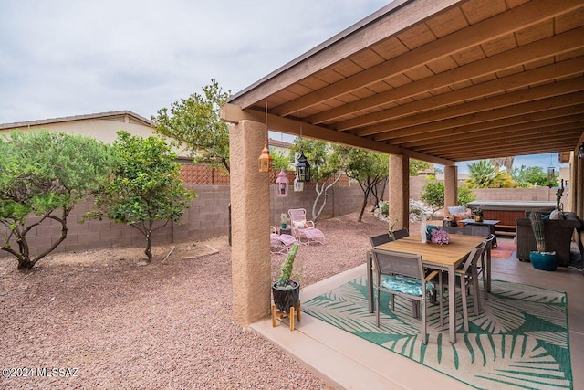 view of patio featuring a hot tub