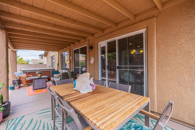 view of patio featuring a hot tub