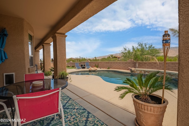 view of pool with a patio area