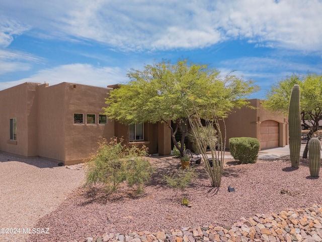 view of front of home featuring a garage