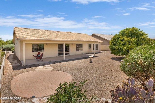 rear view of property with a patio