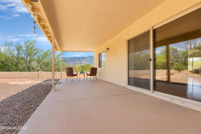 view of patio with a mountain view