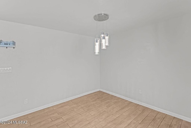 empty room featuring light hardwood / wood-style floors