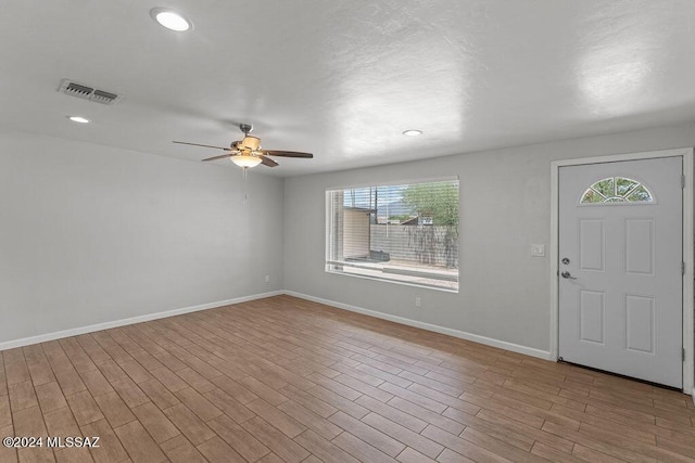 foyer with ceiling fan