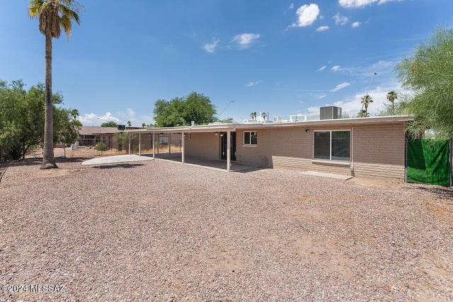 rear view of house featuring a patio