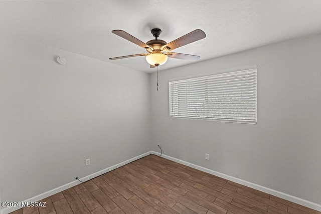 unfurnished room featuring ceiling fan and wood-type flooring