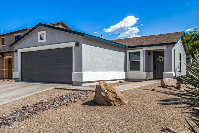 view of front of home with a garage