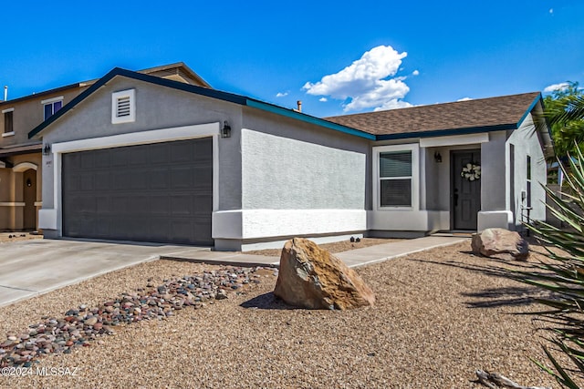 1097 W Camino Luna Llena, Sahuarita, AZ 85629 - ranch-style home with a garage, concrete driveway, stucco siding, and a shingled roof