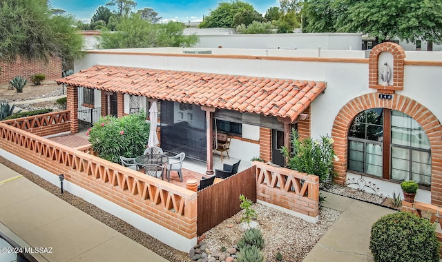 back of house featuring a patio