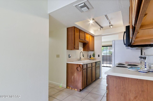 kitchen featuring stainless steel dishwasher, a textured ceiling, sink, electric range, and light tile patterned flooring