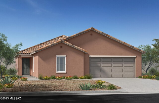 view of front of home with a garage