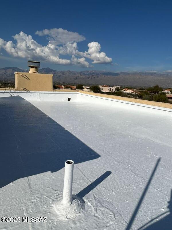 exterior space featuring a mountain view