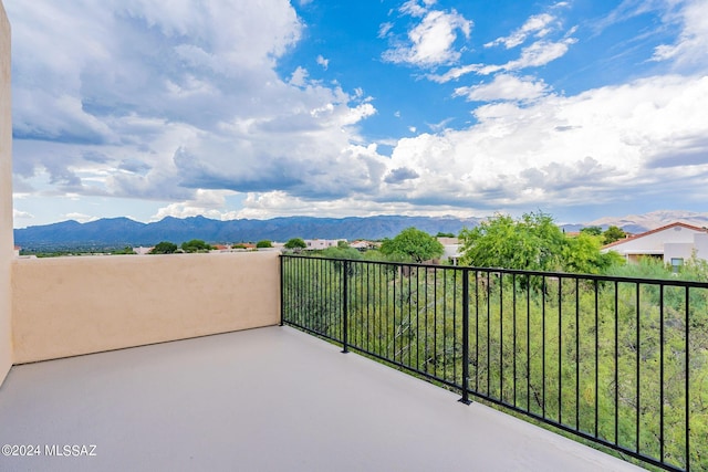 balcony featuring a mountain view