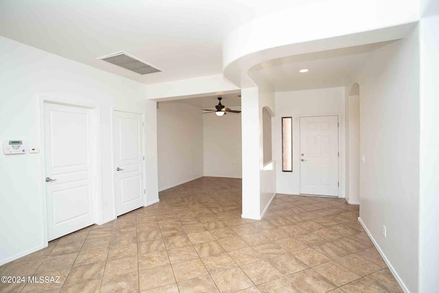 spare room with ceiling fan