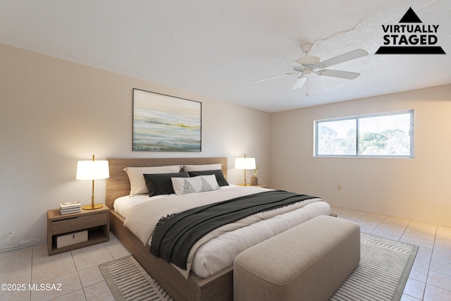 bedroom featuring ceiling fan and light tile patterned flooring