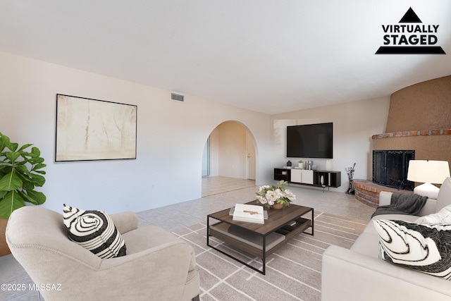 living room with tile patterned floors