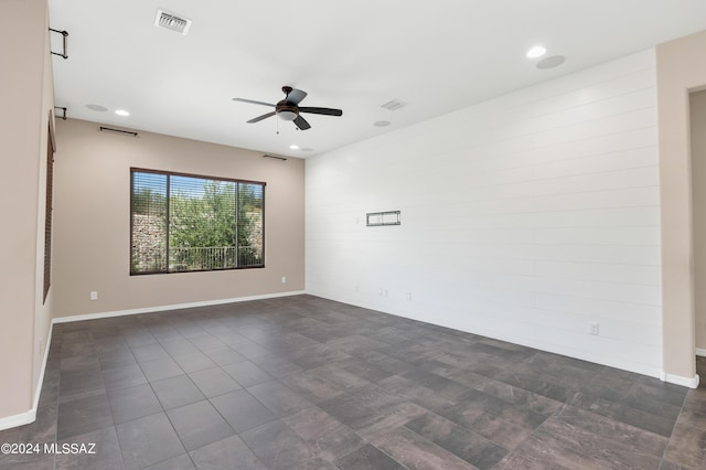 empty room featuring ceiling fan