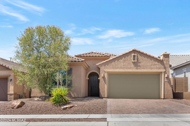 view of front of home featuring a garage