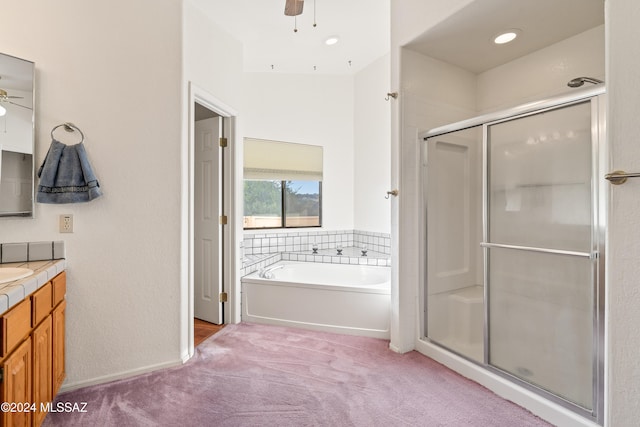 bathroom with vanity, ceiling fan, and separate shower and tub