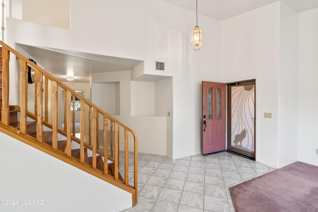 foyer with a high ceiling