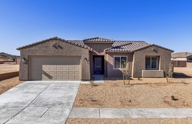 view of front of property featuring a garage