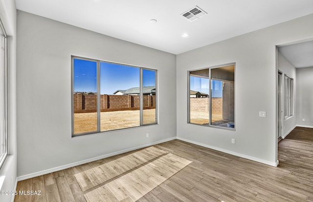 empty room with light wood-type flooring