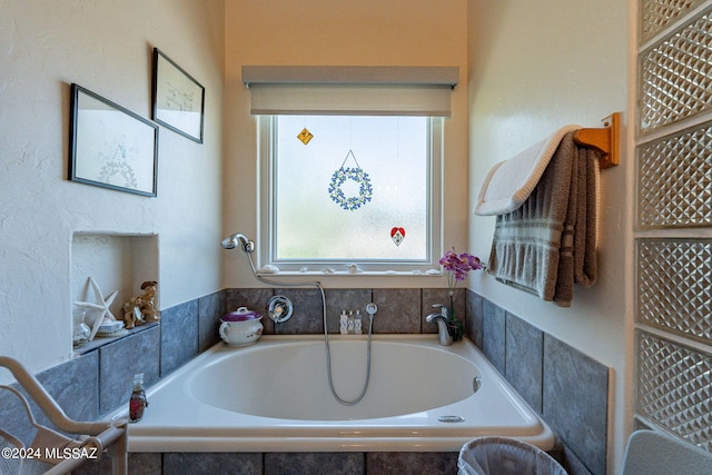 full bathroom featuring a garden tub