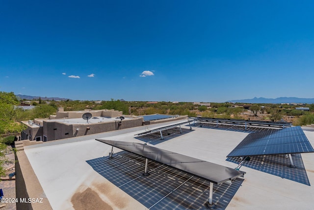 birds eye view of property featuring a mountain view