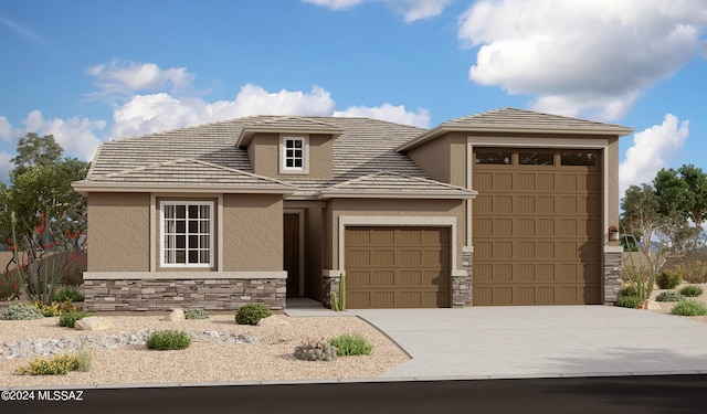 prairie-style home with a garage, stone siding, driveway, and stucco siding