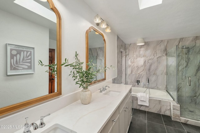 bathroom featuring vanity, a skylight, tile patterned floors, and shower with separate bathtub