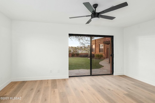 unfurnished room with ceiling fan and light hardwood / wood-style flooring