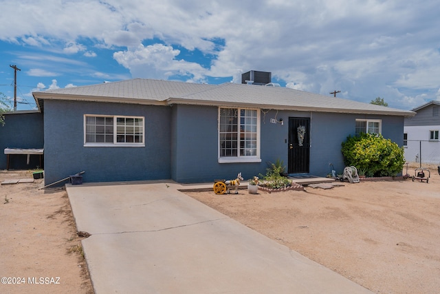 single story home featuring a patio area