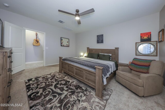 carpeted bedroom featuring ceiling fan