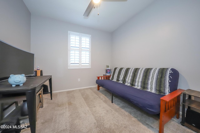 bedroom with ceiling fan, light carpet, and vaulted ceiling