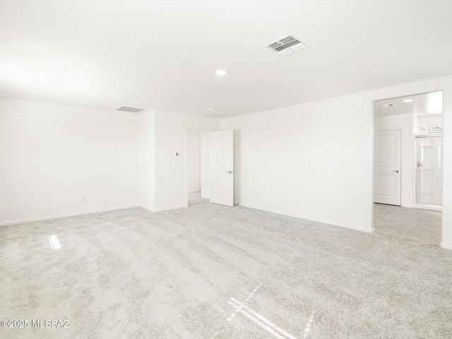 255 N Spring Flower Dr, Tucson, AZ 85748 - empty room with light colored carpet, baseboards, and recessed lighting