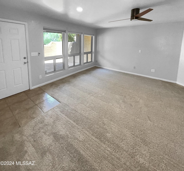 spare room featuring ceiling fan