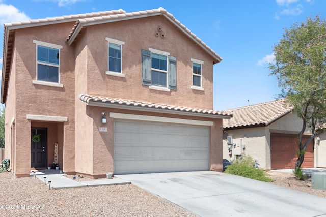 view of front of home with a garage