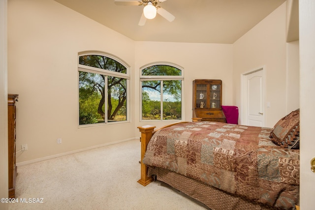 bedroom featuring lofted ceiling and ceiling fan