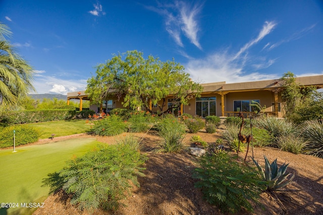 exterior space featuring a front yard