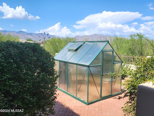 view of outdoor structure featuring a mountain view