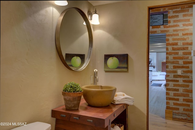 27 Circulo De Prado, Tubac, AZ 85646 - bathroom featuring wood-type flooring and sink